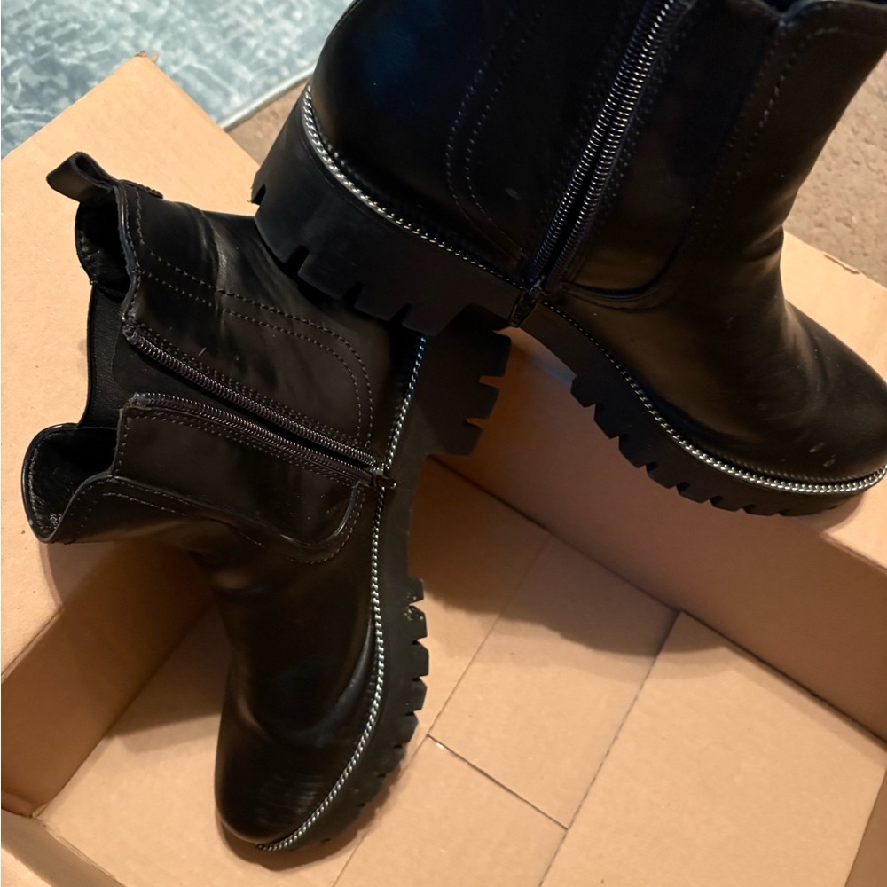 Limelight Black Lug-Sole Zip Ankle Boots